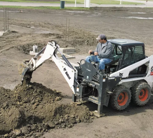 MINICARGADOR BOBCAT S630 CON BRAZO EXCAVADOR